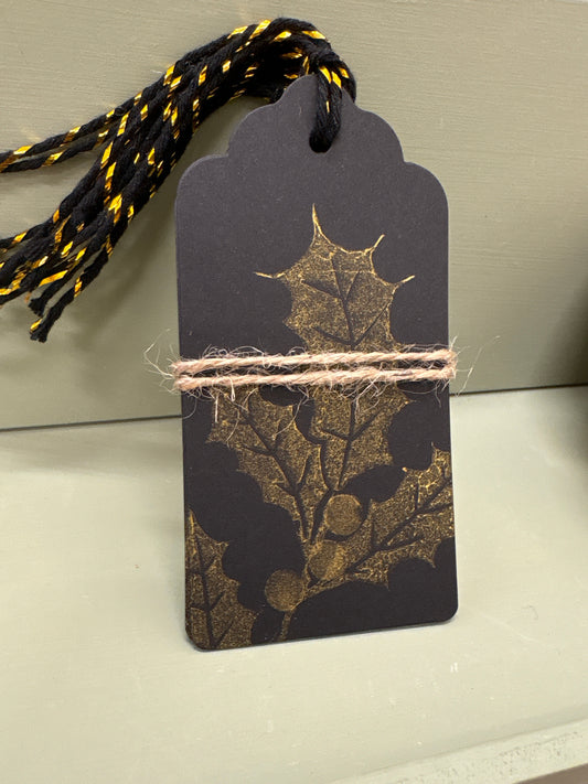 Gold holly present tags for gift wrapping