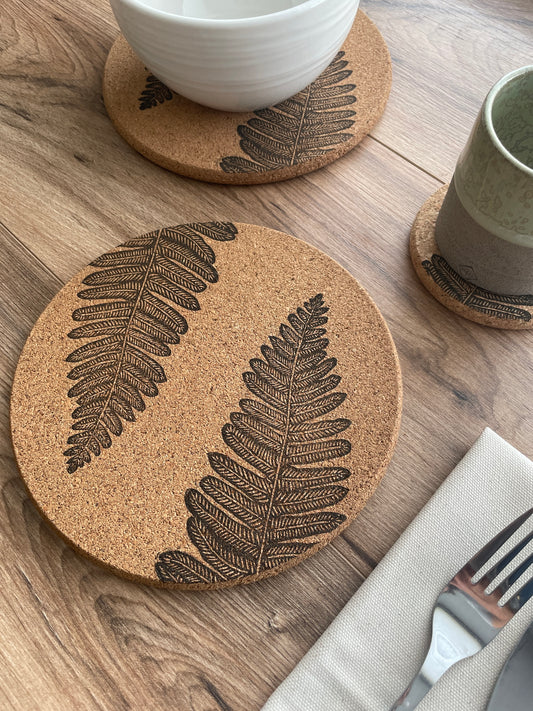 Fern linocut printed cork placemat with table setting including bowl, cup and napkin with cutlery